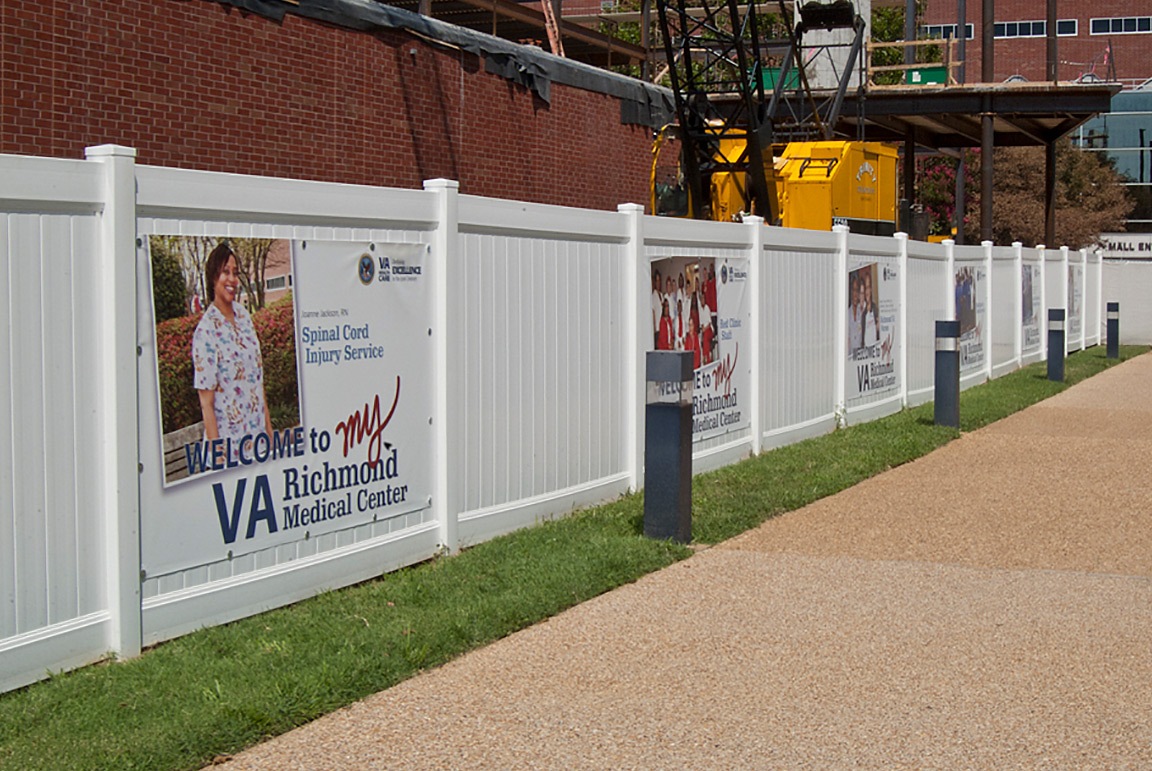 banners displayed on fence