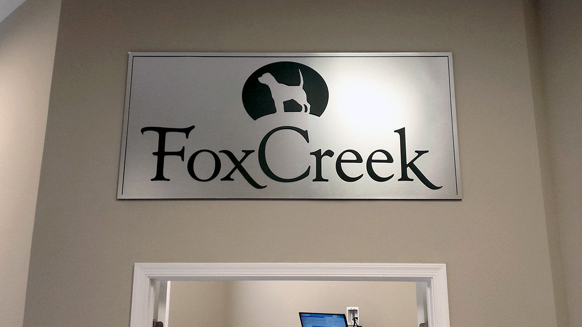 fox creek metal sign