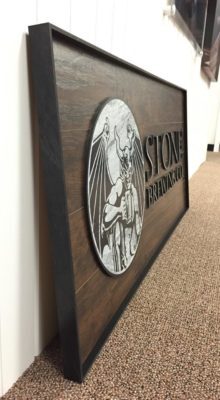 side view of stone brewing sign