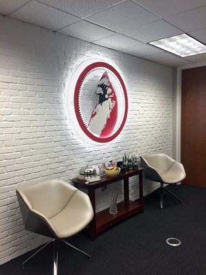 backlit printed acrylic panel installed in office