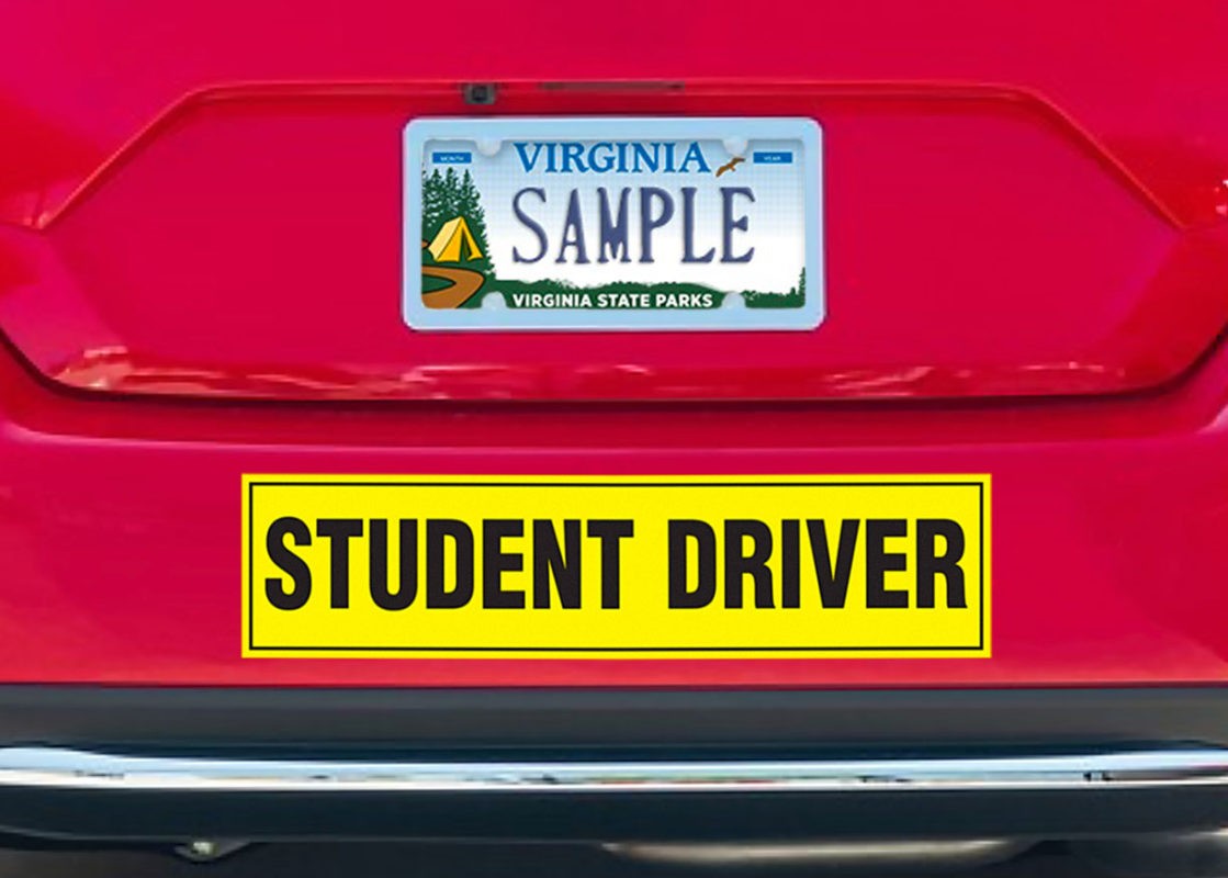student driver sticker on car