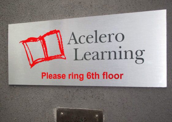 acelero learning signage in office