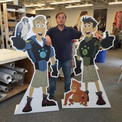 cartoon character standees with height reference