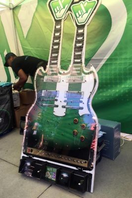 custom guitar stand at tradeshow side view