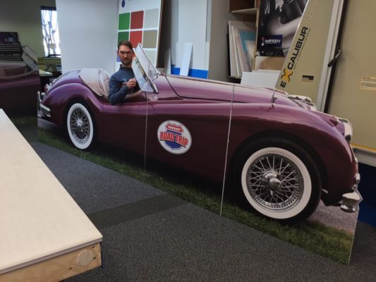 interactive car standee with man