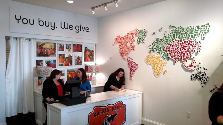 dimensional wall art in baby clothes store