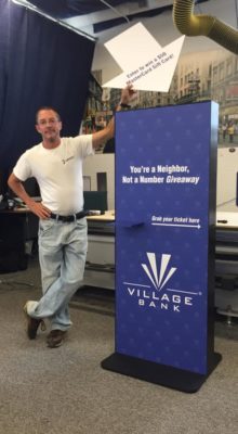 ticket providing floor stand display