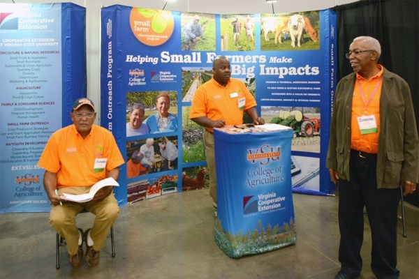 curved backdrop wall and fabric podium cover