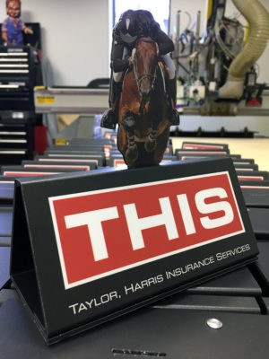 shape cut jockey display stand