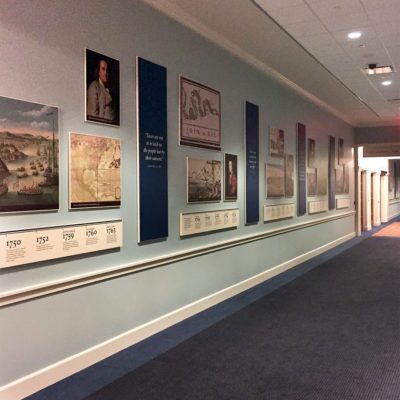informational chronological plaques installed down hallway