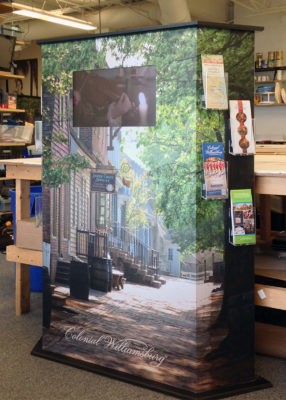 display stand with screen and literature holders