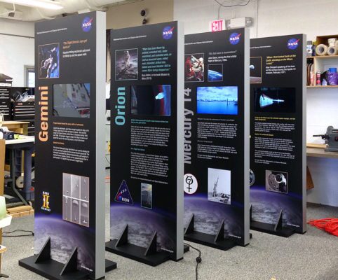large printed floor stands for nasa