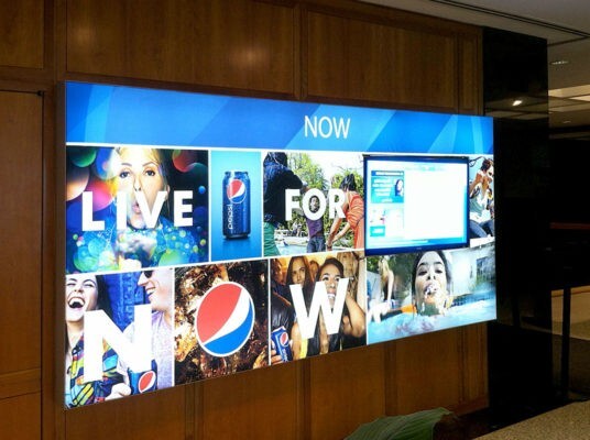 large litebox displayed on wall in lobby