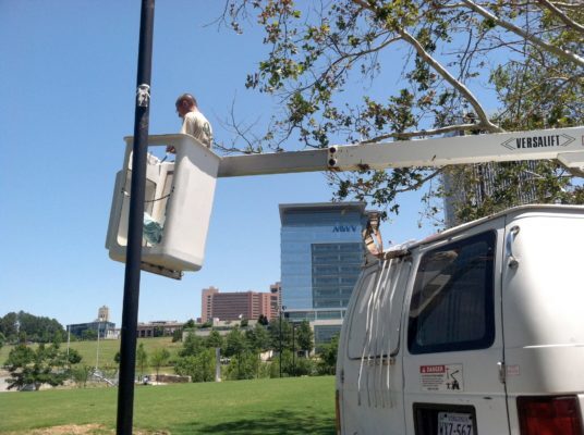 bucket truck pole banner installation